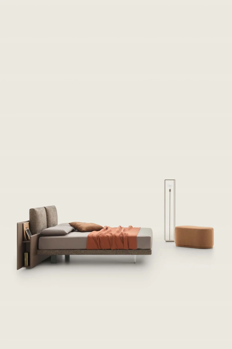 Opera — Bookcase bed with headboard featuring large cushions.