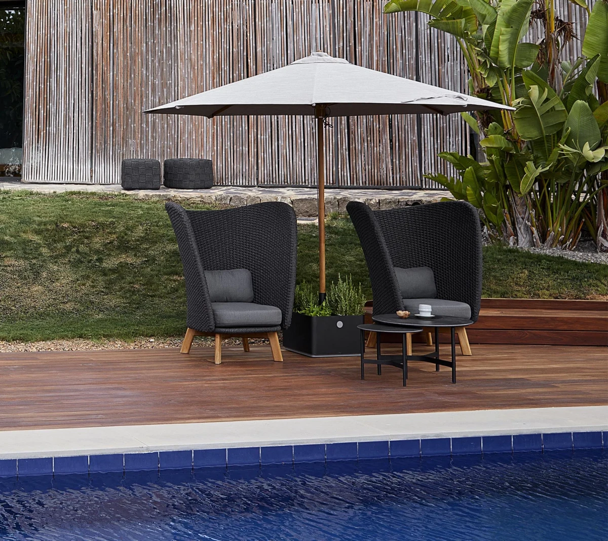 Peacock Wing highback chair w/teak legs