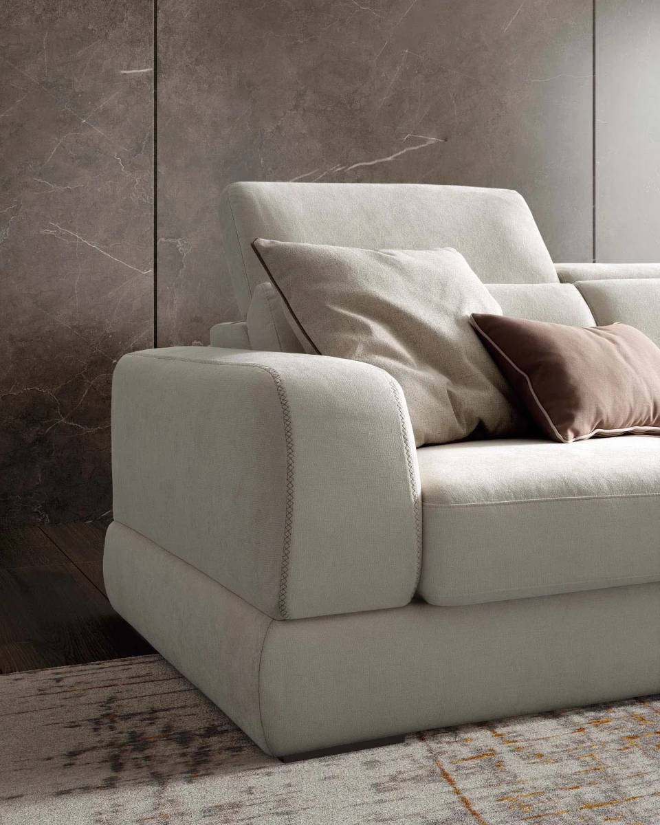 Graffiti — Elegant sofa with extendable seats, adjustable headrests, and visible stitching.