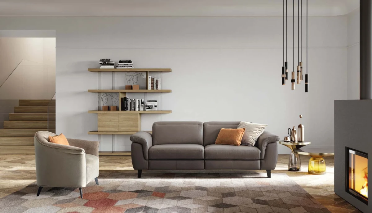 Zeno — Modern recliner sofa with adjustable headrests in a curved, enveloping design.