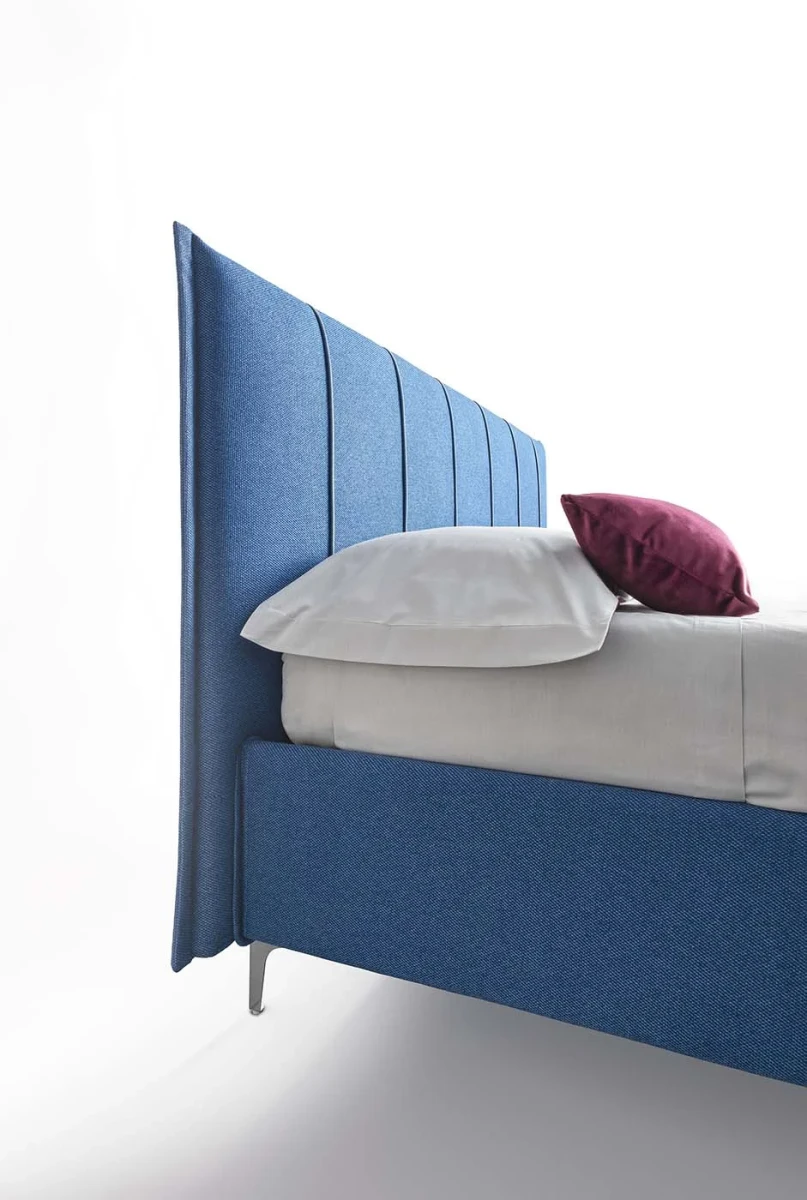 Plumeria — Space-saving bed with a vertically stitched padded headboard.