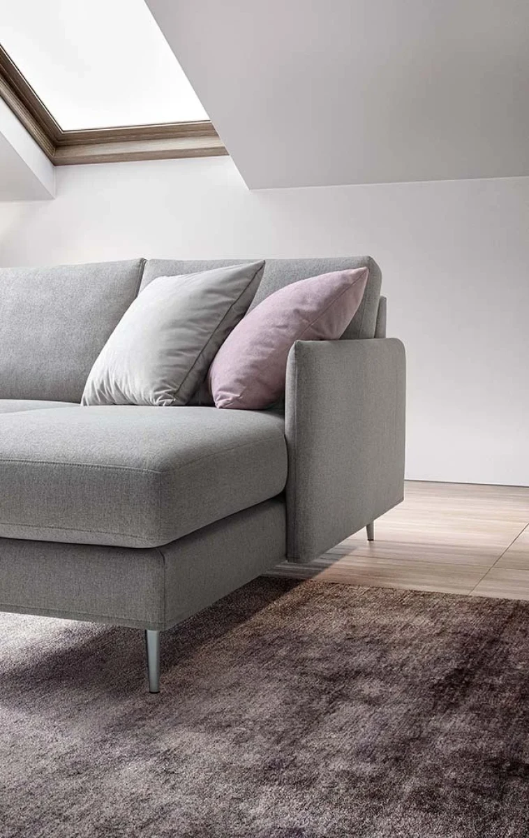 Mimas — Space-saving sofa with varying backrest heights and asymmetrical corner seating.
