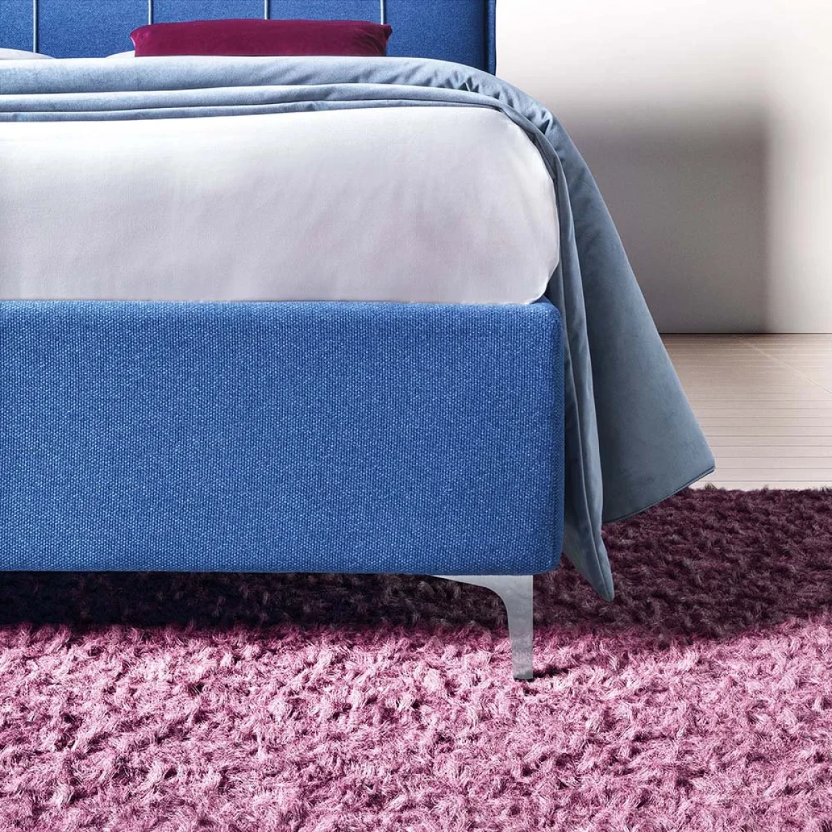 Plumeria — Space-saving bed with a vertically stitched padded headboard.
