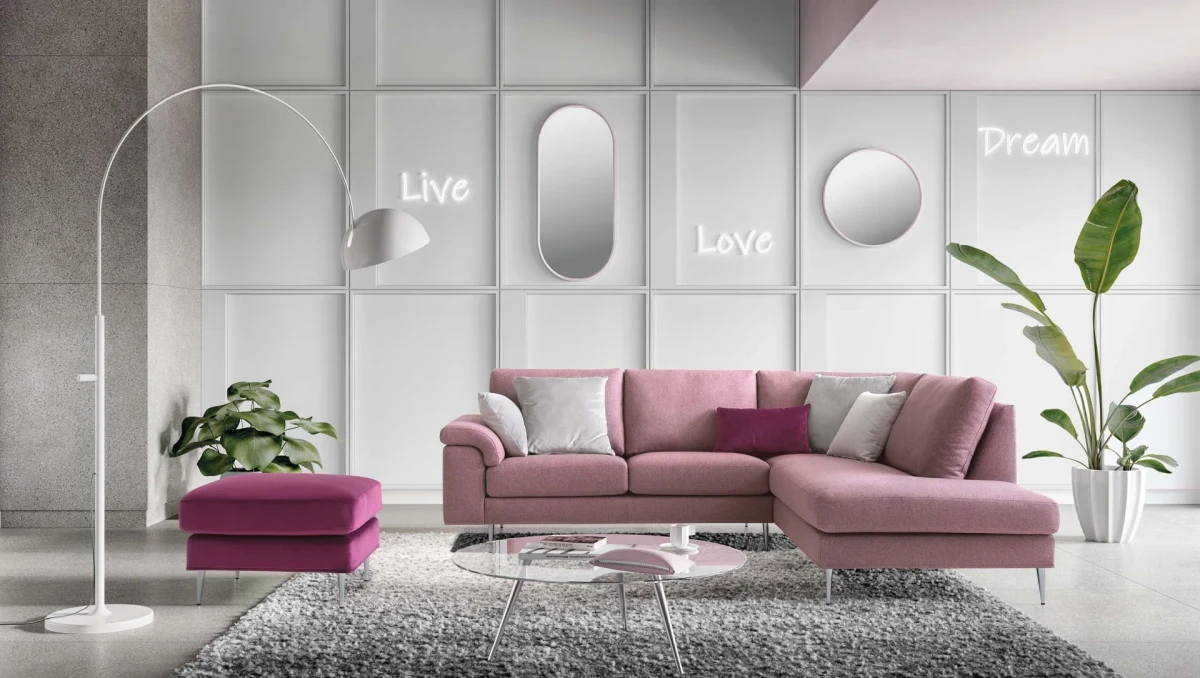 Papilio — Sofa with extendable footrest, rounded armrests, and asymmetrical corner seating.
