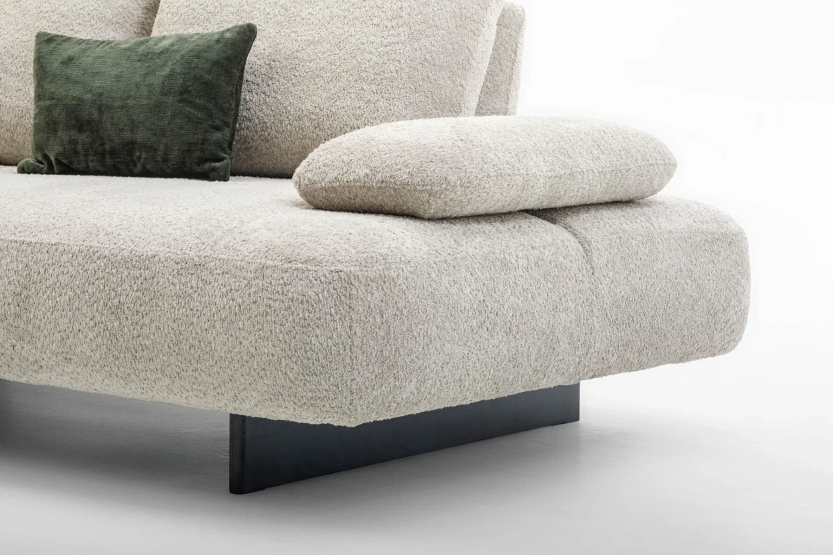 Fanny — Modular sofa with organic shapes, sliding backrests, and adjustable armrests