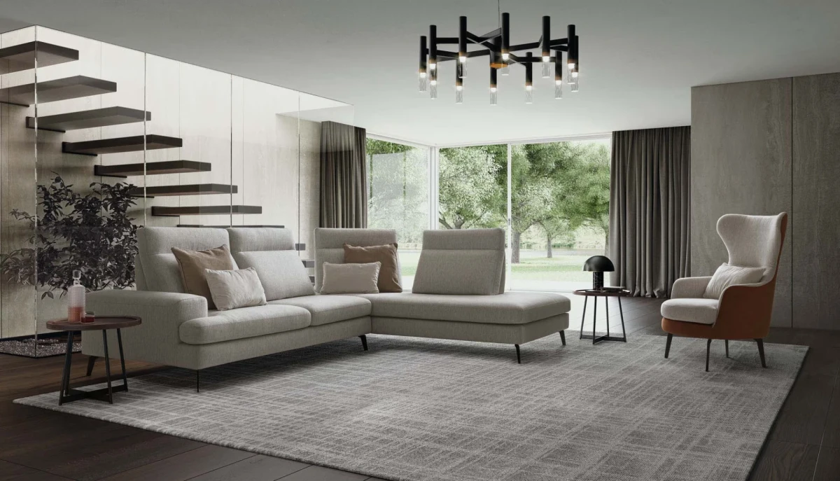 Emmet — Sofa with sliding backrests.