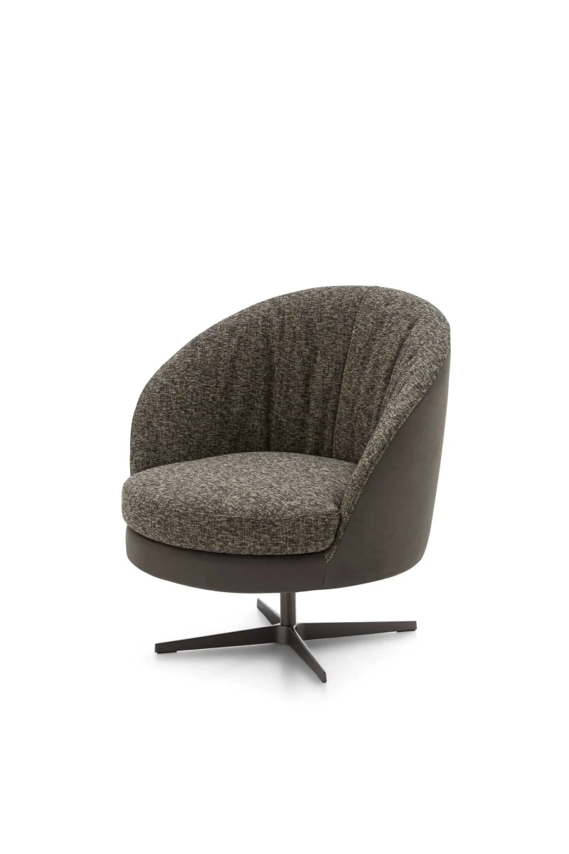 Oyster — Enveloping, rounded armchair with a seashell-inspired design. Fixed or swivel base options available.