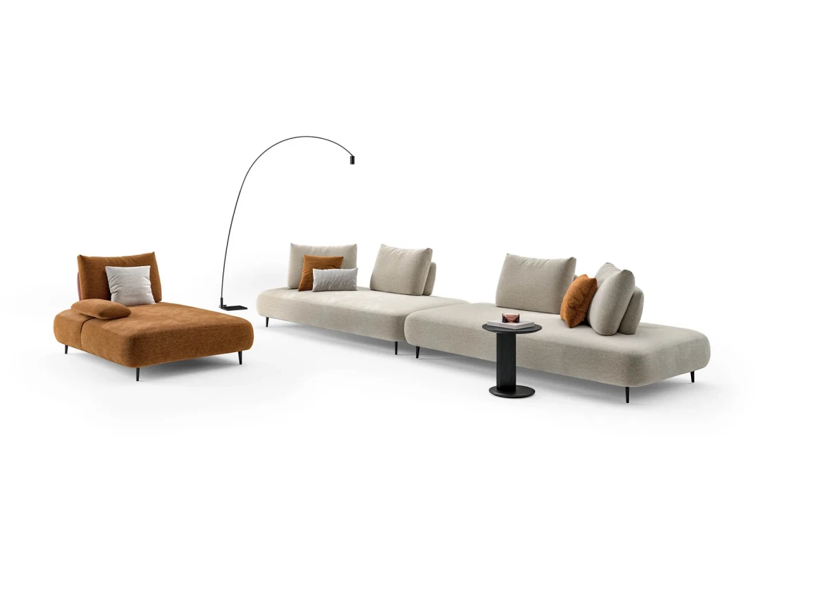 Fanny — Modular sofa with organic shapes, sliding backrests, and adjustable armrests