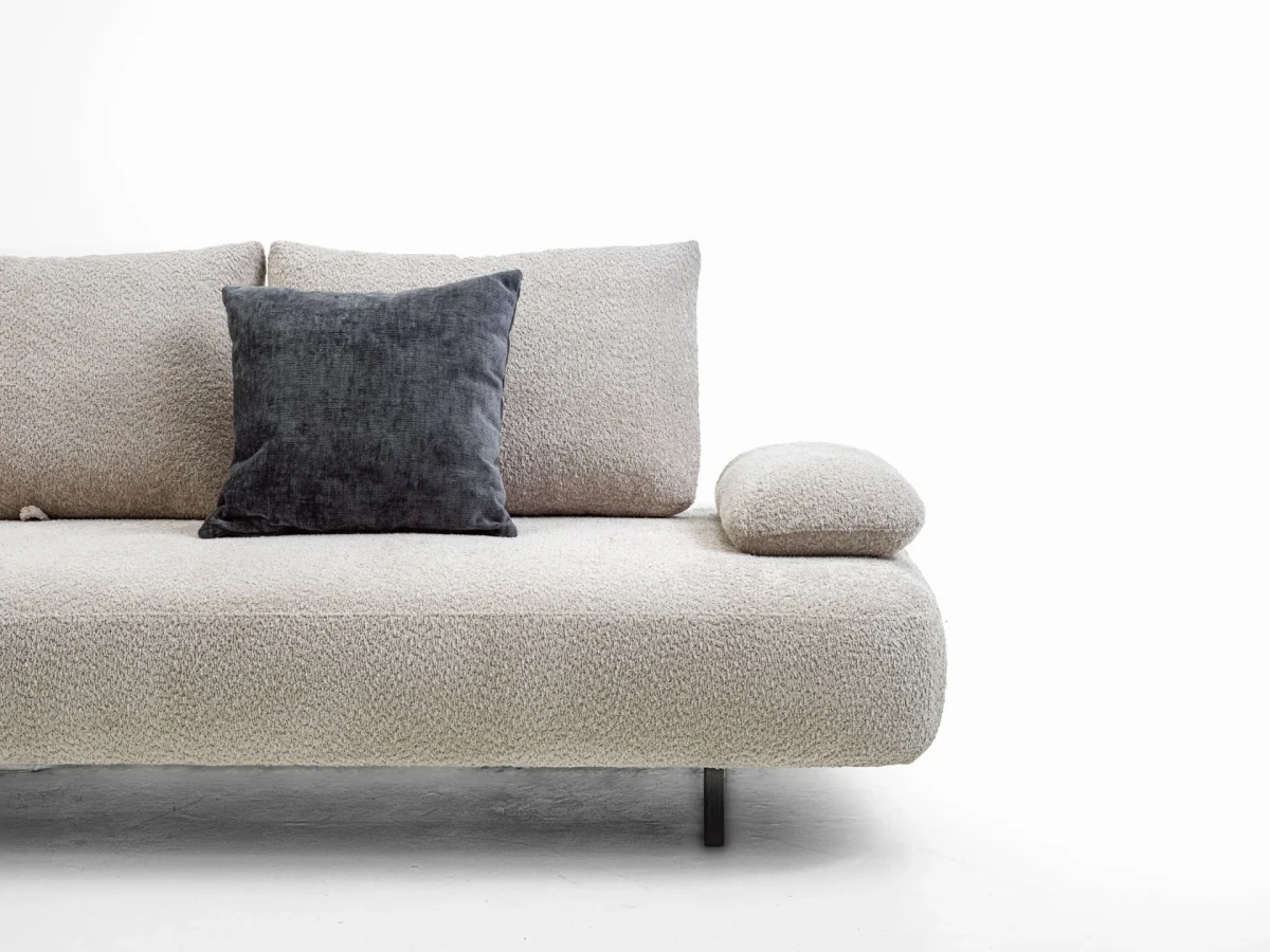 Fanny — Modular sofa with organic shapes, sliding backrests, and adjustable armrests