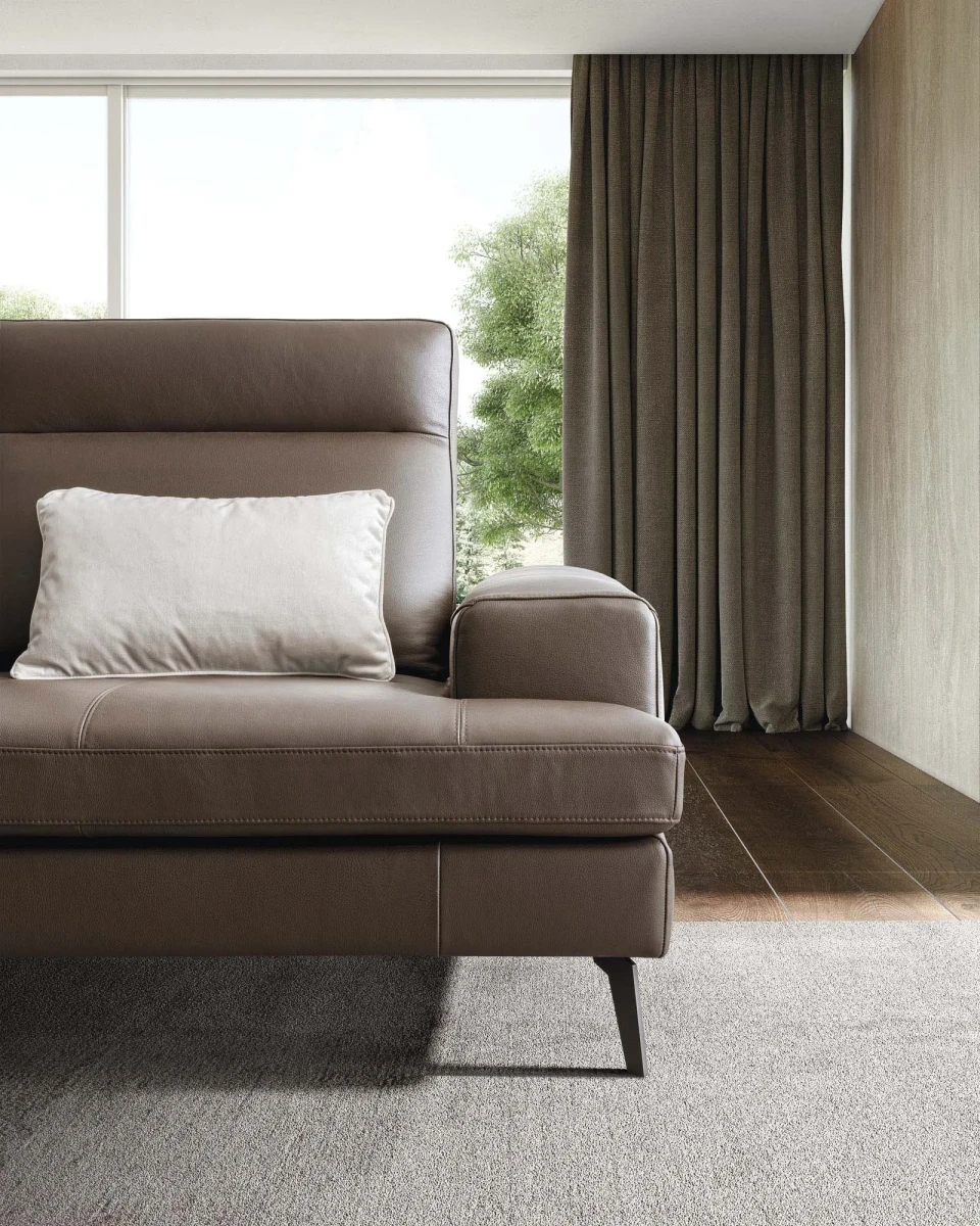 Emmet — Sofa with sliding backrests.
