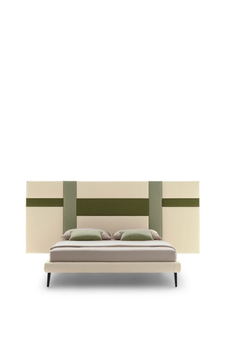 Ground — Contract bed with a headboard made of vertical padded panels.