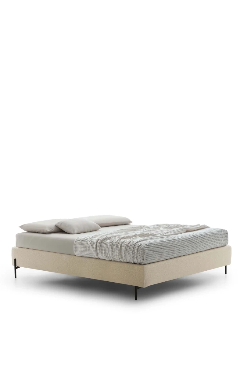 Sommier — Minimalist space-saving bed with no headboard or footboard.
