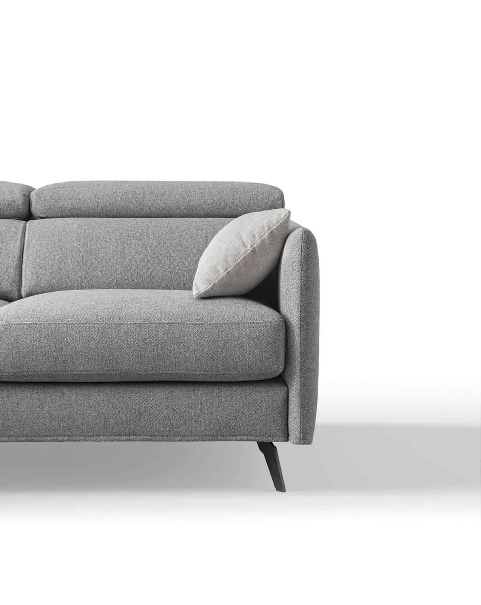 Vanessa — Modern sofa with adjustable headrests and asymmetrical corner seating.