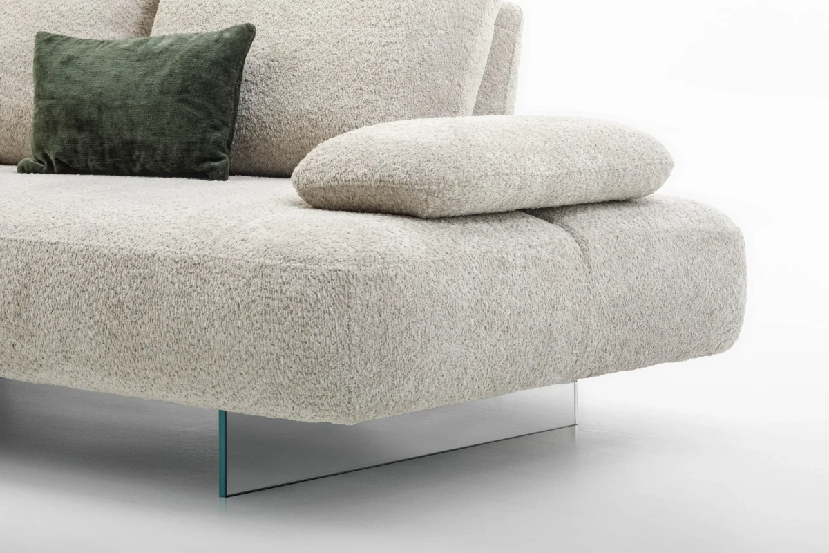 Fanny — Modular sofa with organic shapes, sliding backrests, and adjustable armrests