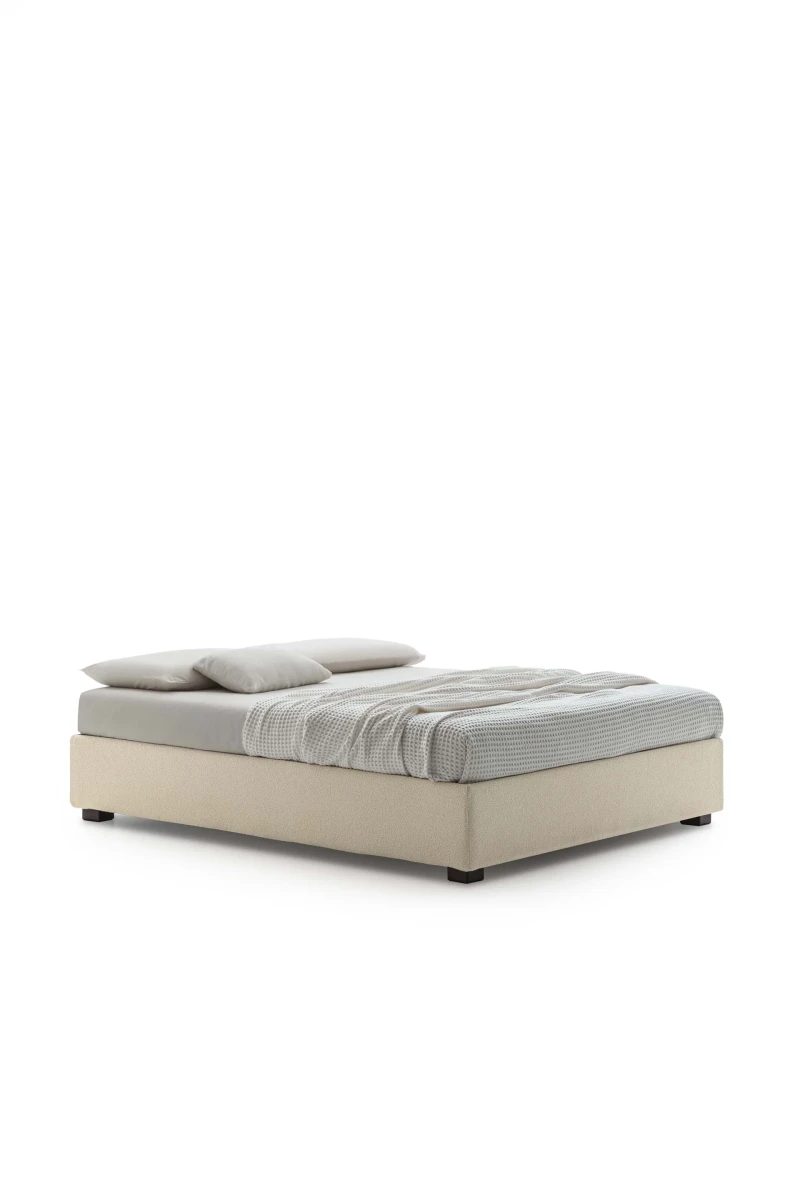 Sommier — Minimalist space-saving bed with no headboard or footboard.