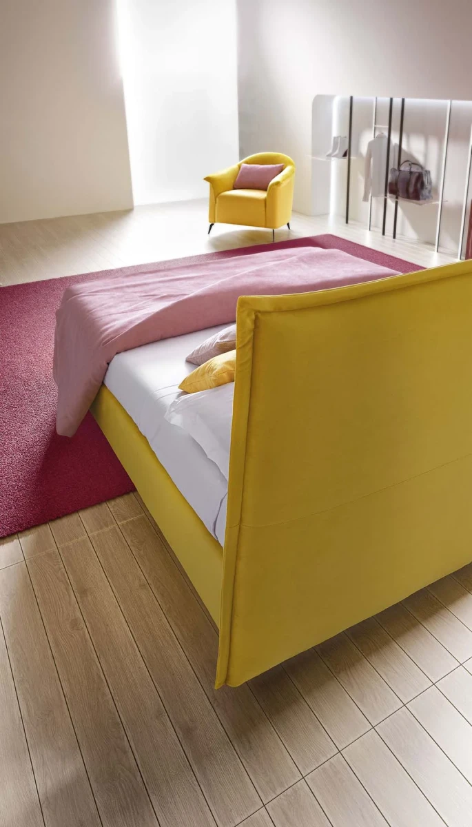 Silene — Minimalist space-saving bed with a straight-line padded headboard.