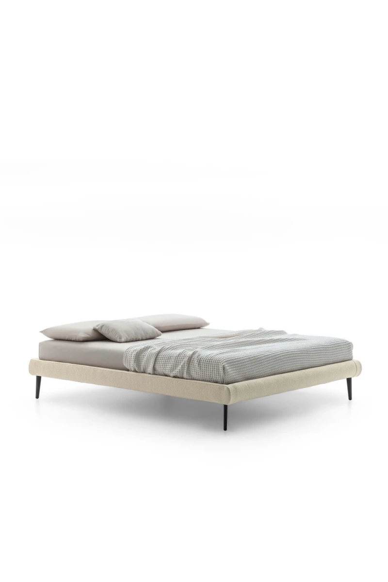 Sommier — Minimalist space-saving bed with no headboard or footboard.