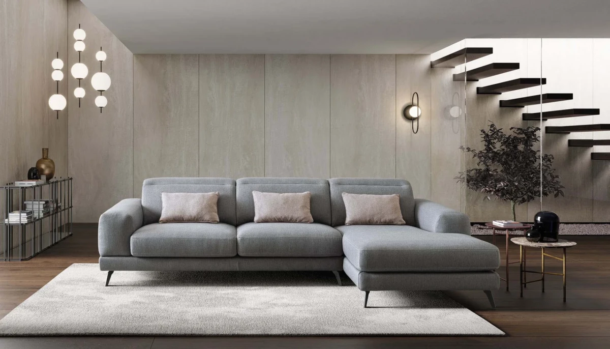Harvey — Rounded sofa with extendable seats and adjustable headrests.