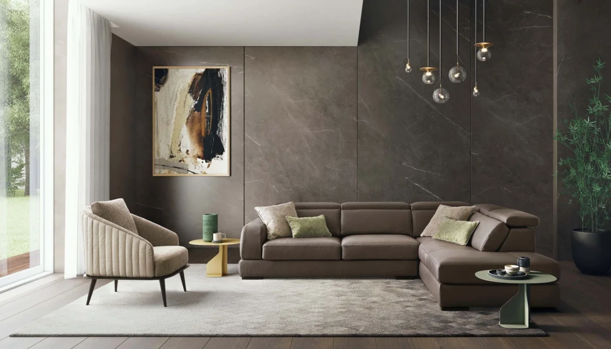 Graffiti — Elegant sofa with extendable seats, adjustable headrests, and visible stitching.