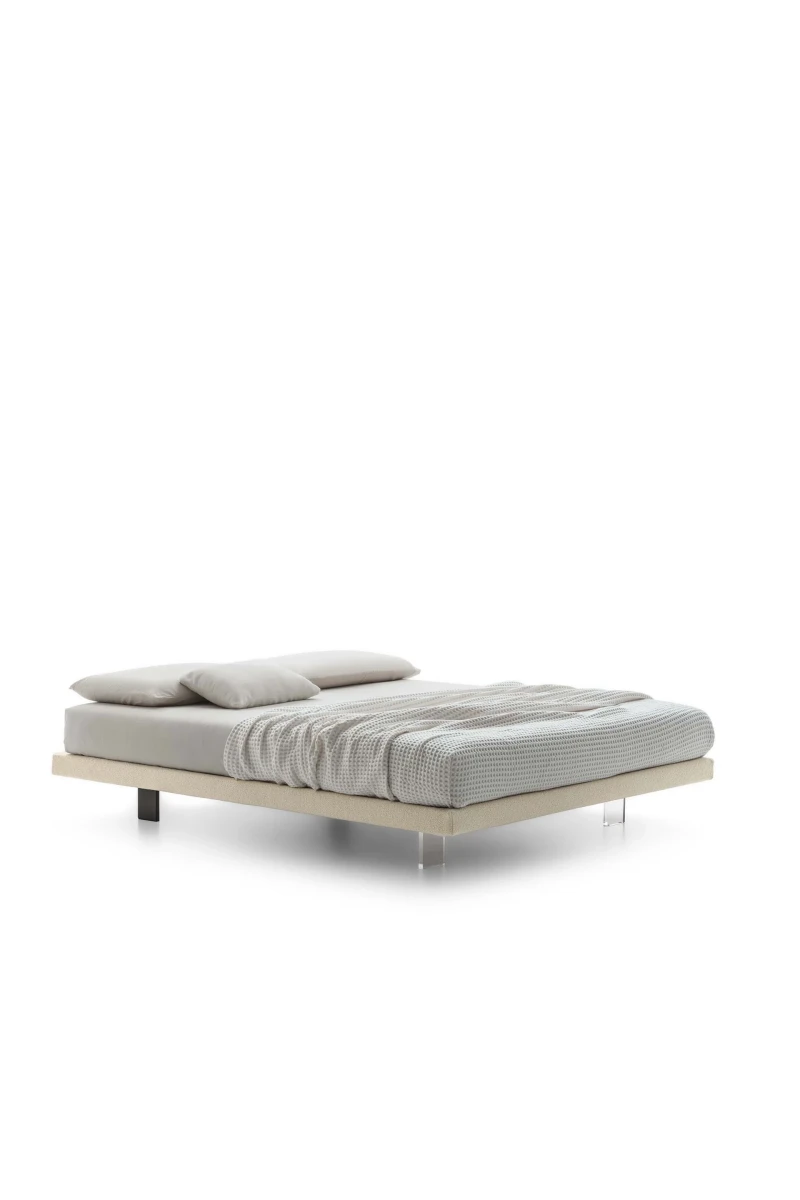 Sommier — Minimalist space-saving bed with no headboard or footboard.
