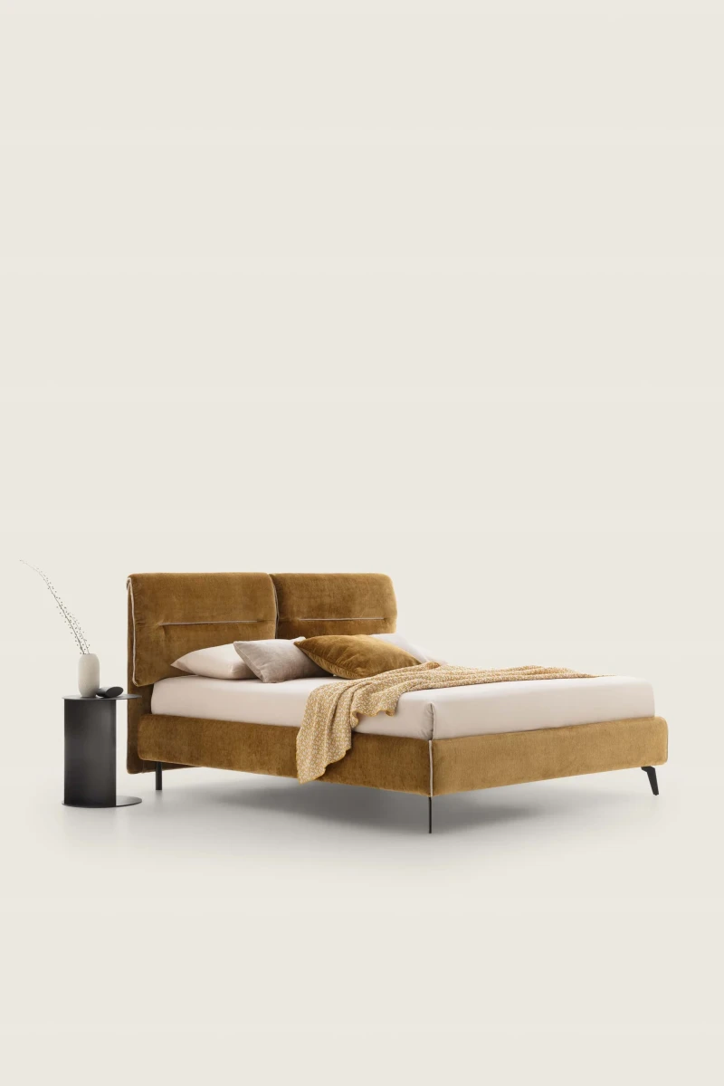 Academy — Comfortable bed with soft cushions integrated into the headboard