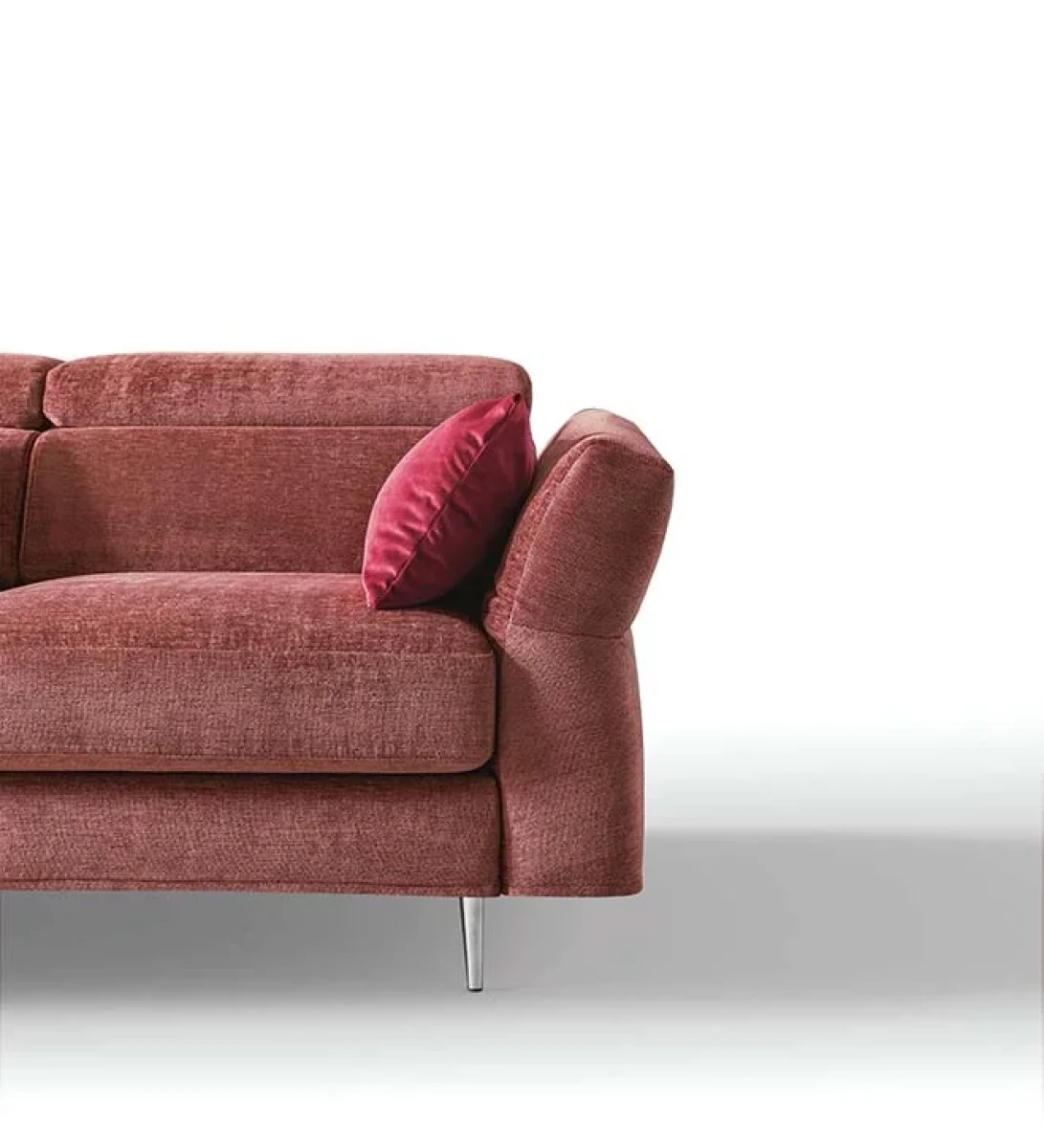 Aurora — Sofa with asymmetrical corner seating, adjustable headrests and armrests, and extendable footrest mechanism.