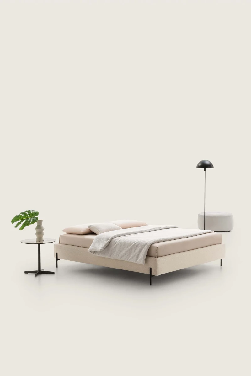 Sommier — Minimalist space-saving bed with no headboard or footboard.