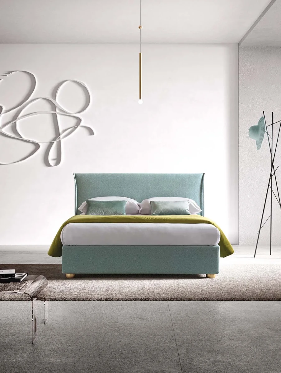 Hesperis — Space-saving bed with a simple, curved padded headboard.