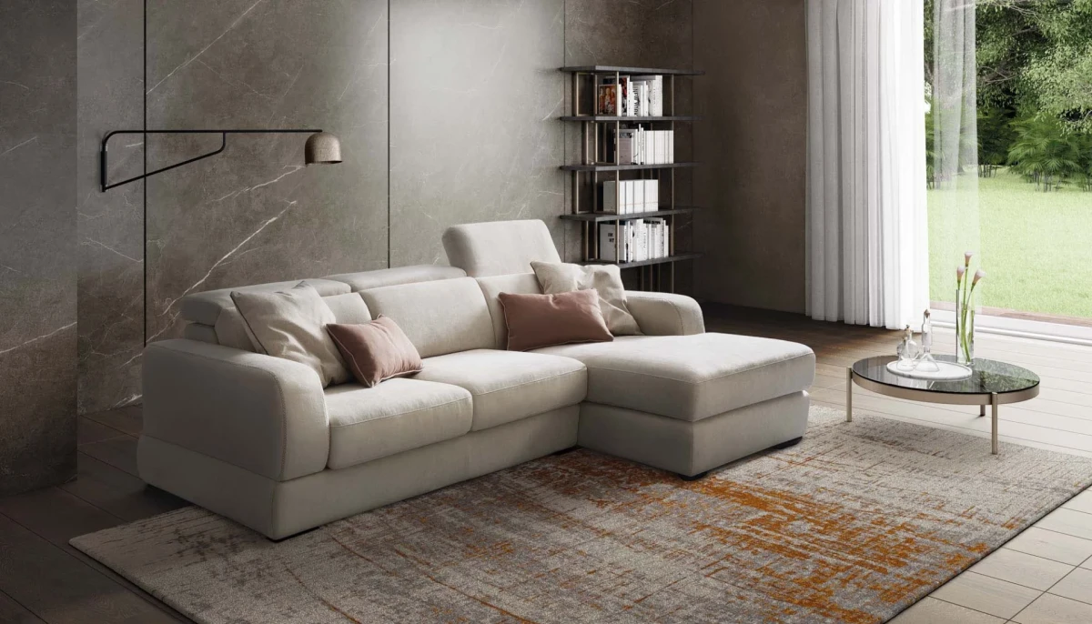 Graffiti — Elegant sofa with extendable seats, adjustable headrests, and visible stitching.