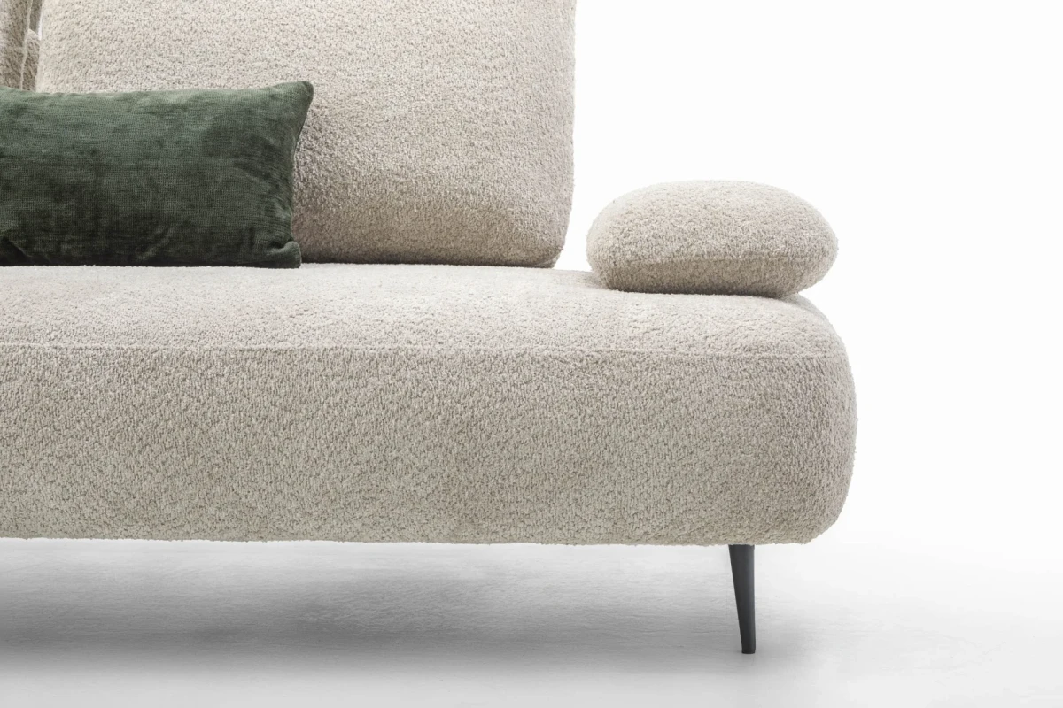 Fanny — Modular sofa with organic shapes, sliding backrests, and adjustable armrests