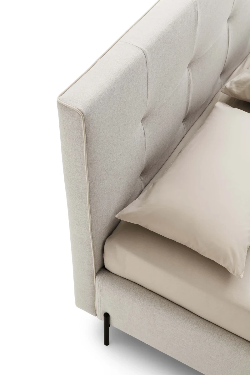 Love — Modern squared bed with light tufting on the headboard and decorative piping.