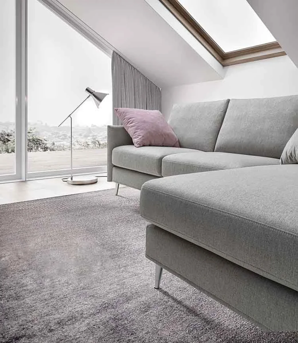 Mimas — Space-saving sofa with varying backrest heights and asymmetrical corner seating.