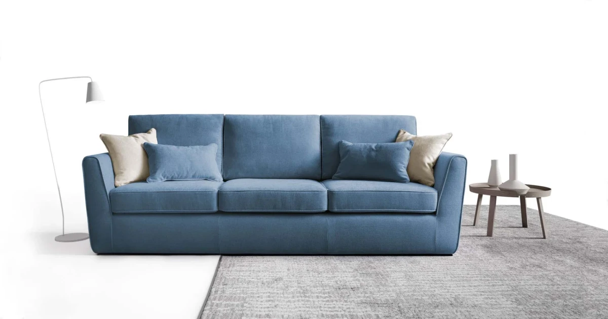 Lola — Space-saving sofa with decorative borders and highlighted stitching.
