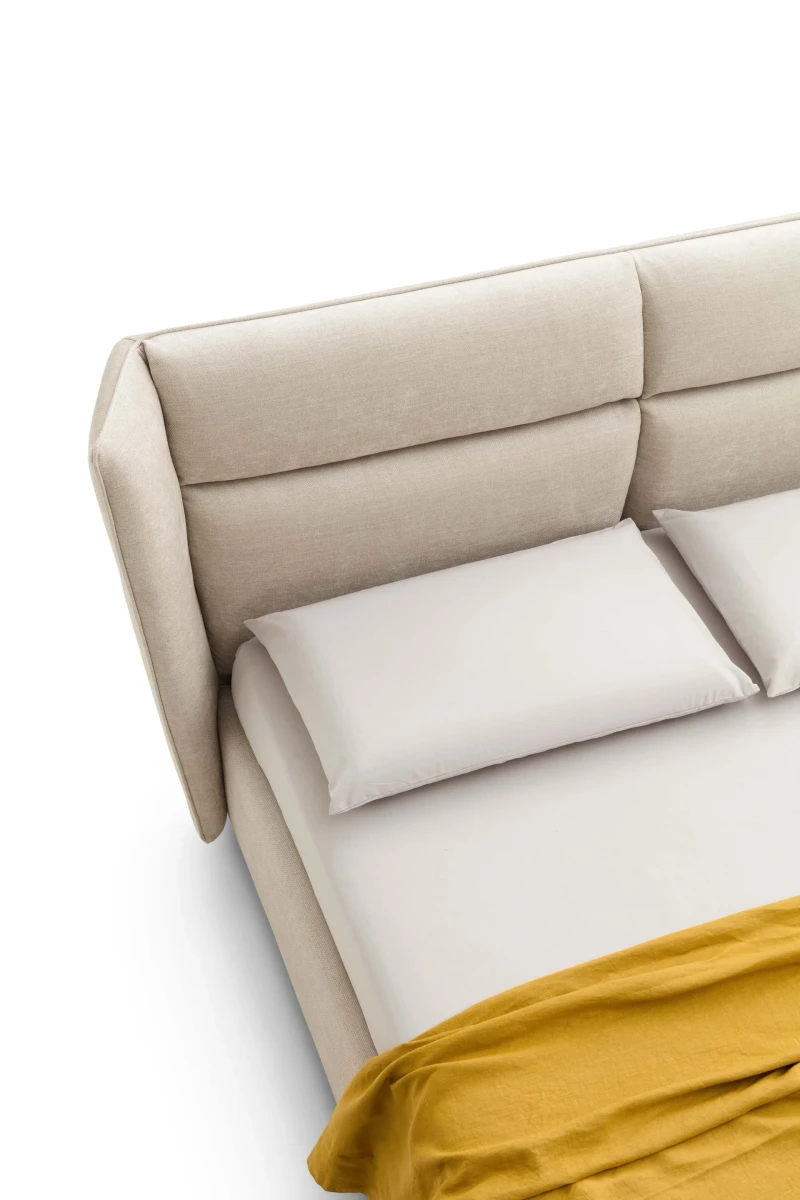 Pasodoble — Elegant wingback bed with wide padded headboard.