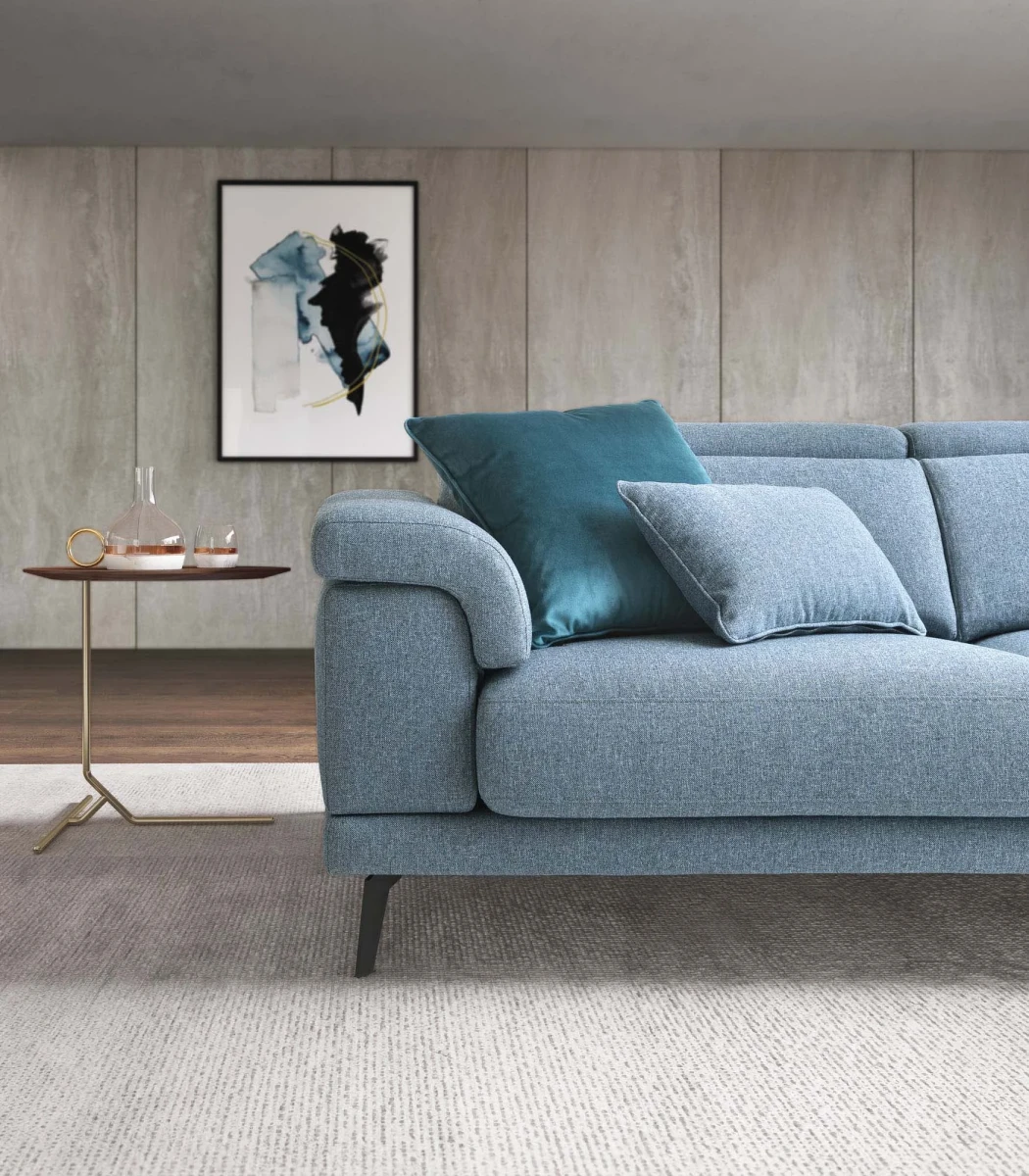 Norton — Modern sofa with extendable seats, adjustable headrests, and decorative borders.