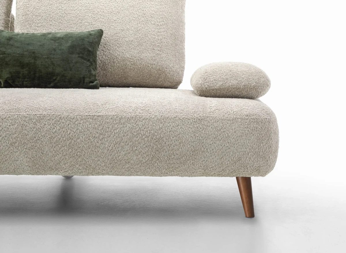 Fanny — Modular sofa with organic shapes, sliding backrests, and adjustable armrests