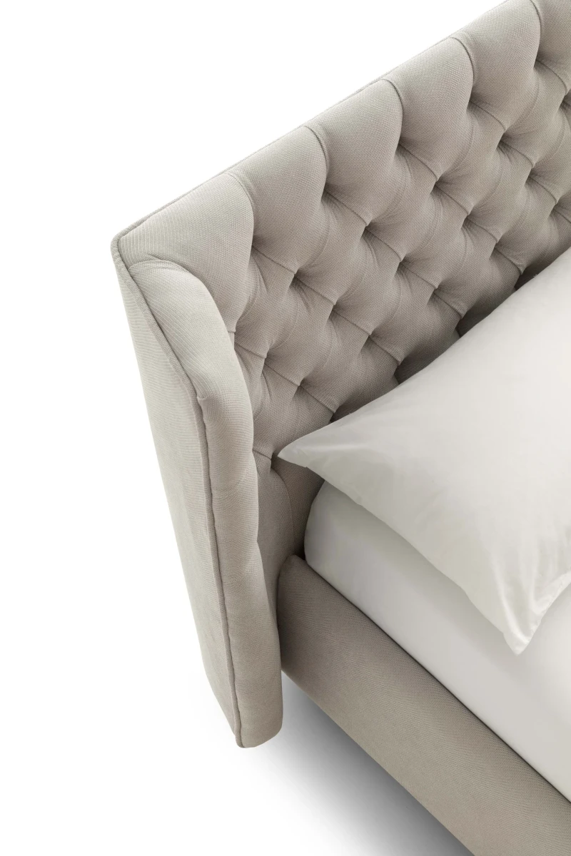 Caravaggio — Classic-style wingback bed with tufted headboard.