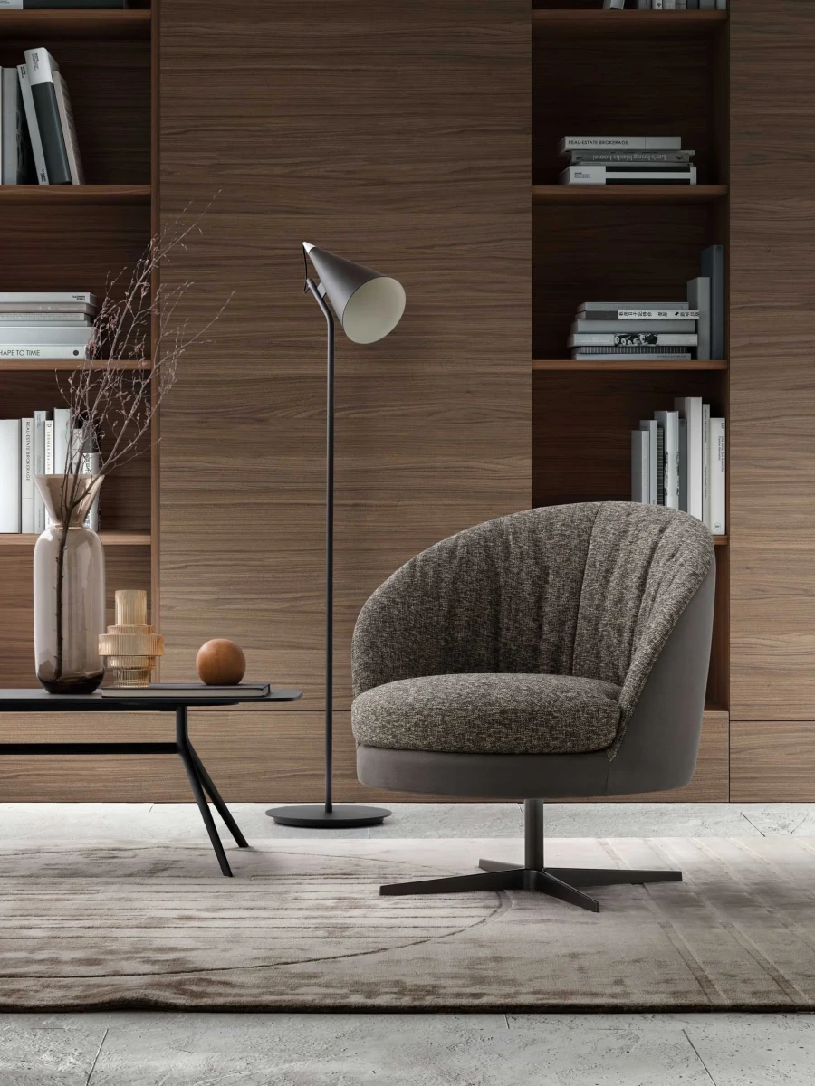 Oyster — Enveloping, rounded armchair with a seashell-inspired design. Fixed or swivel base options available.