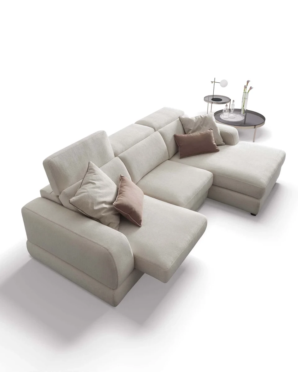 Graffiti — Elegant sofa with extendable seats, adjustable headrests, and visible stitching.