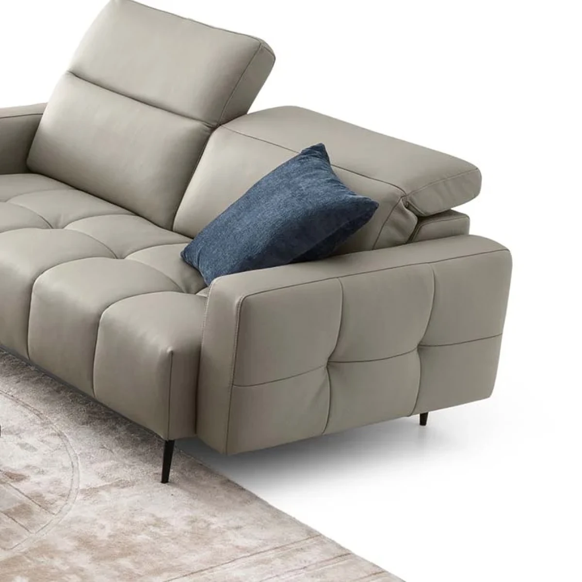 Gillan — Modular sofa with a rounded design, adjustable headrests, and a chaise lounge.