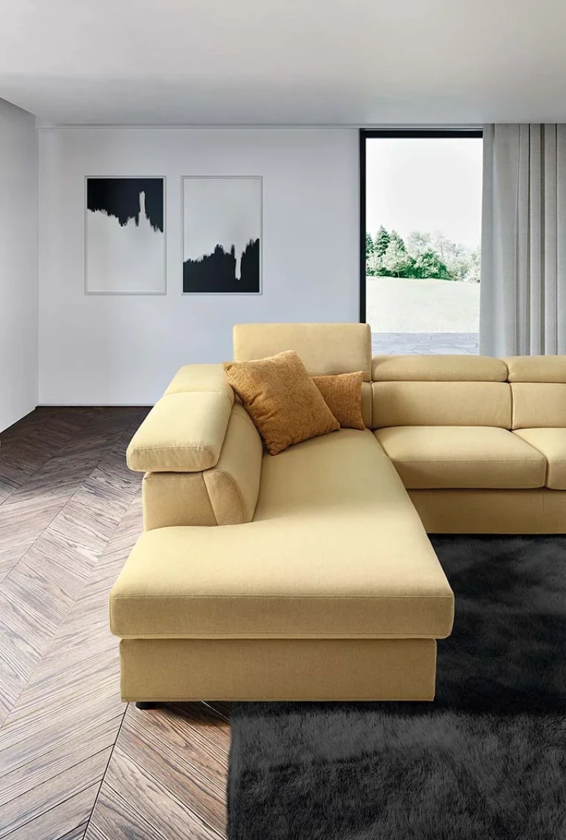 Alessandra — Classic sofa with storage, adjustable headrests, and extendable footrests. Rounded armrests.