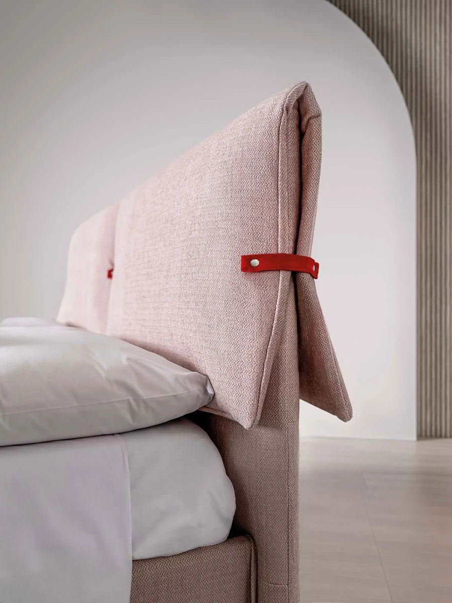 Primrose — Space-saving bed with a headboard featuring large padded cushions secured with buckles.