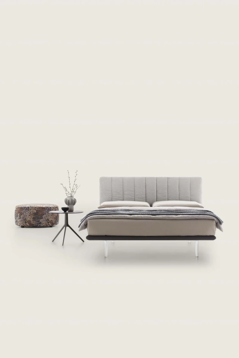 Celine — Space-saving design bed with a vertically padded headboard.