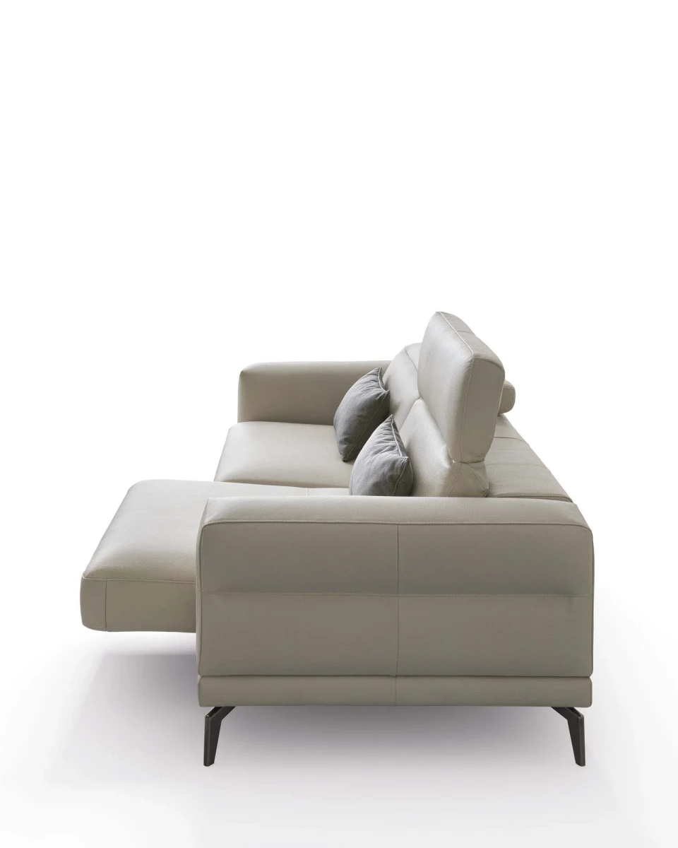 Lambert — Modern sofa with sliding seats, adjustable headrests, and raised borders.