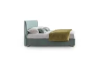 Hesperis — Space-saving bed with a simple, curved padded headboard.