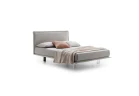 Vasco — Space-saving bed with a smooth padded headboard and piping detail.