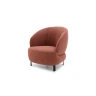 Guapa — Eccentric armchair with a quilted, rounded base and curved backrest.