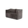 Kubik Loveseat — One-piece frame loveseat with a cubic shape and visible corded edges.