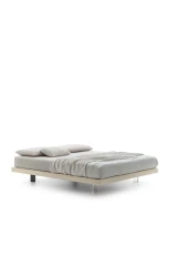 Sommier — Minimalist space-saving bed with no headboard or footboard.