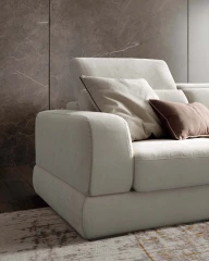 Graffiti — Elegant sofa with extendable seats, adjustable headrests, and visible stitching.